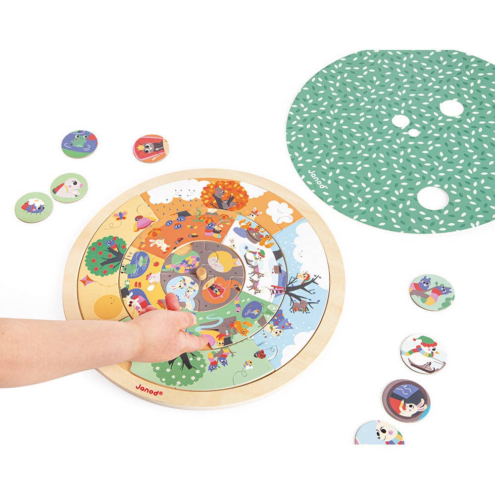Children's educational board game with colorful illustrations and circular wooden board on a white background