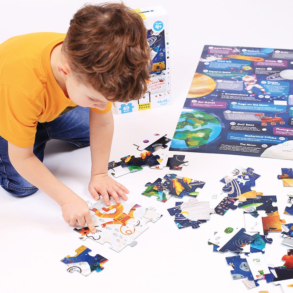 Child playing with a puzzle set on a white surface