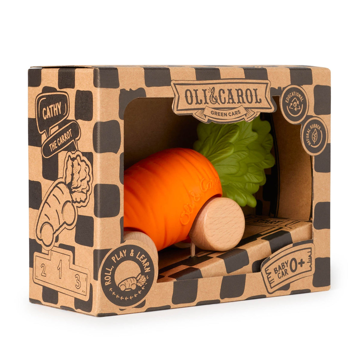 Toy carrot and baby car in a cardboard box with 'Oli & Carol' branding.