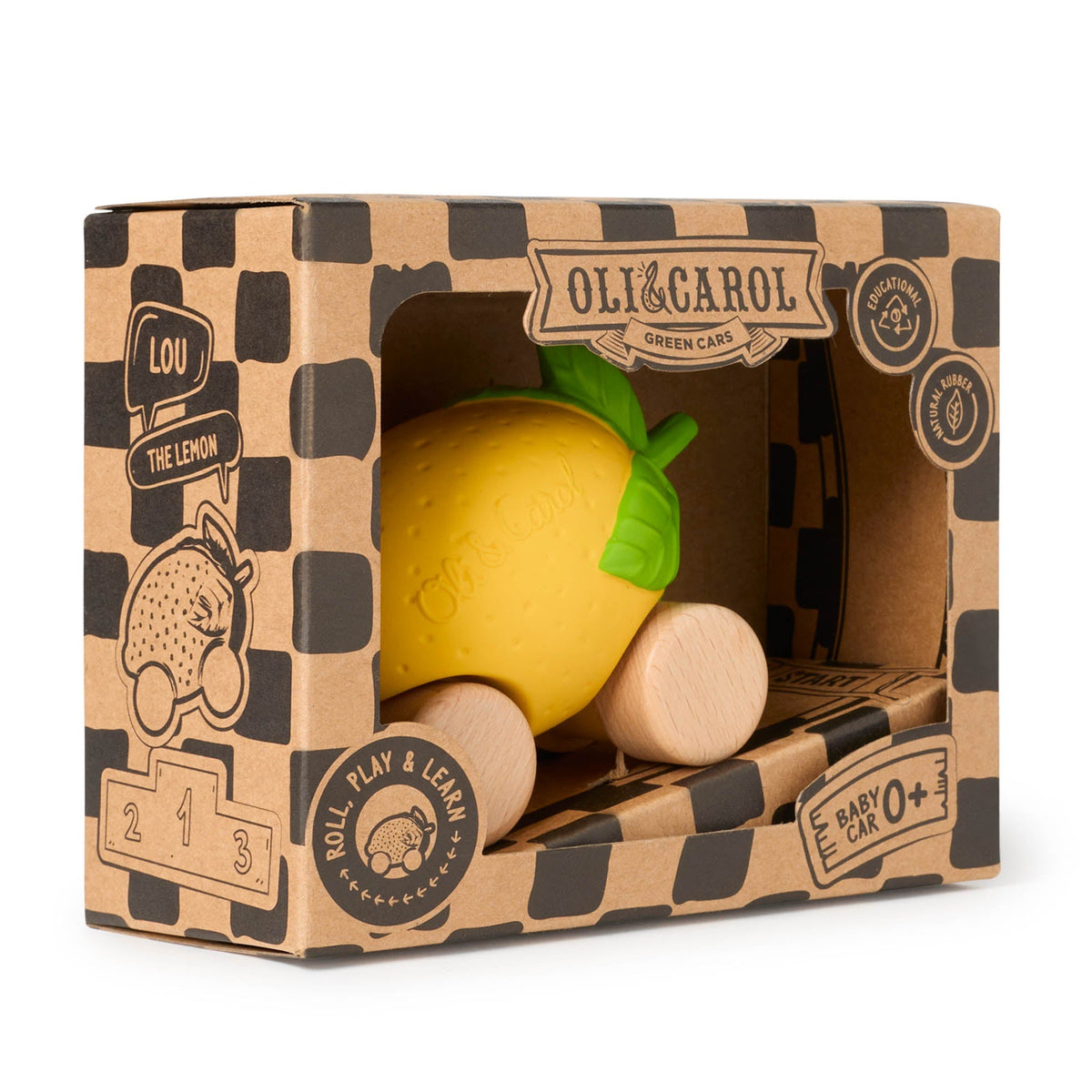 Yellow lemon-shaped toy with green leaves in a cardboard box branded 'Oli & Carol'.