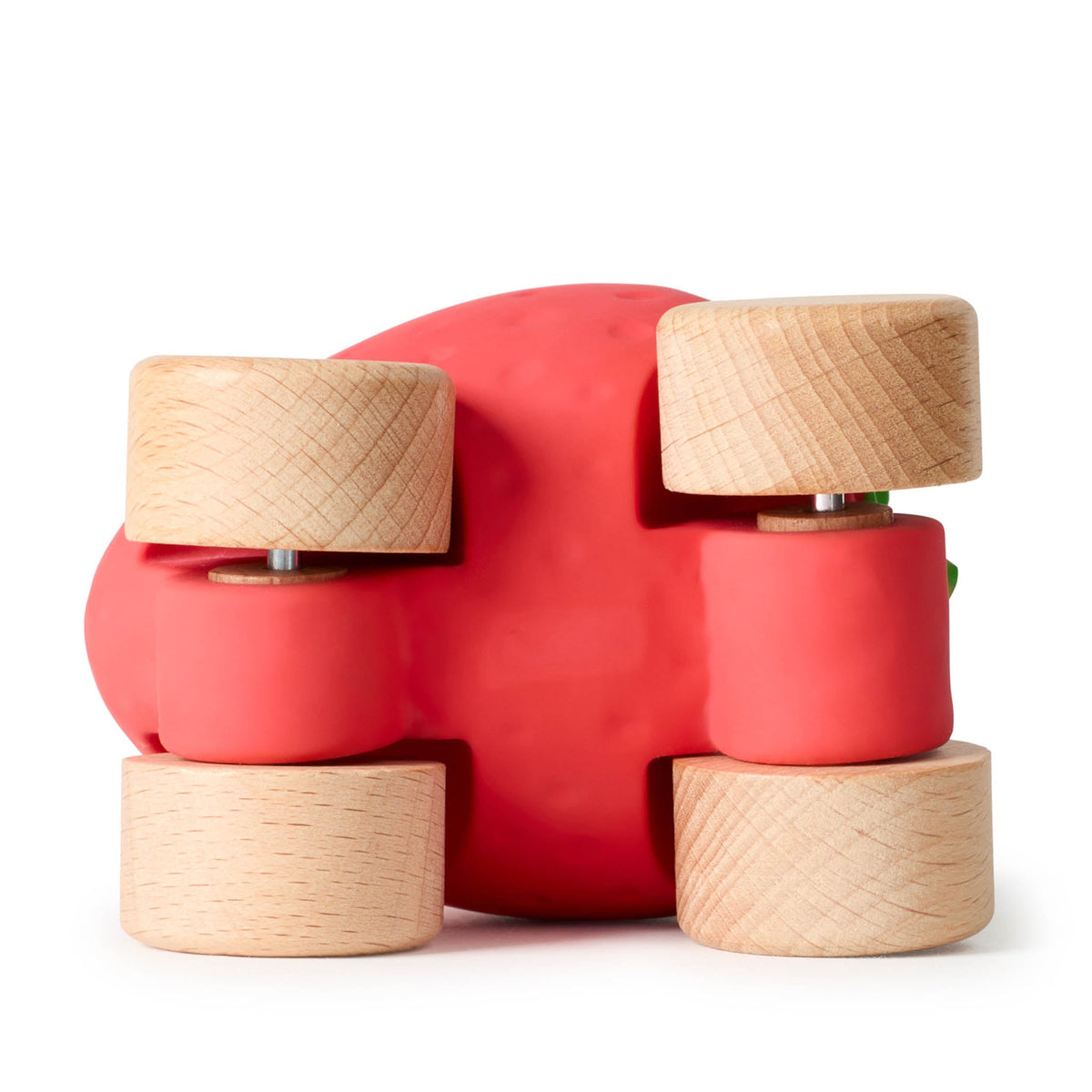 Red toy with wooden wheels on a white background