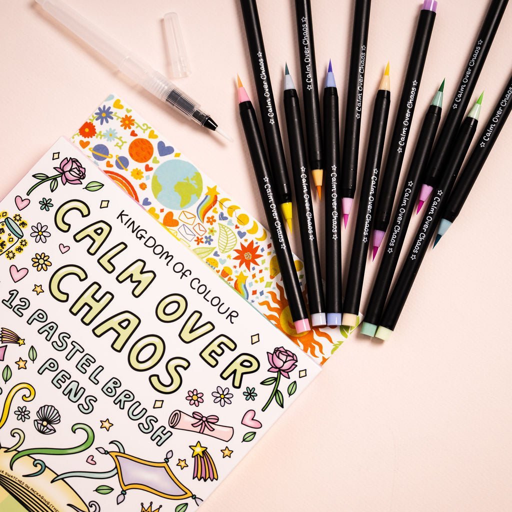 Set of Calm Over Chaos pastel brush pens on a colorful card with illustrations.