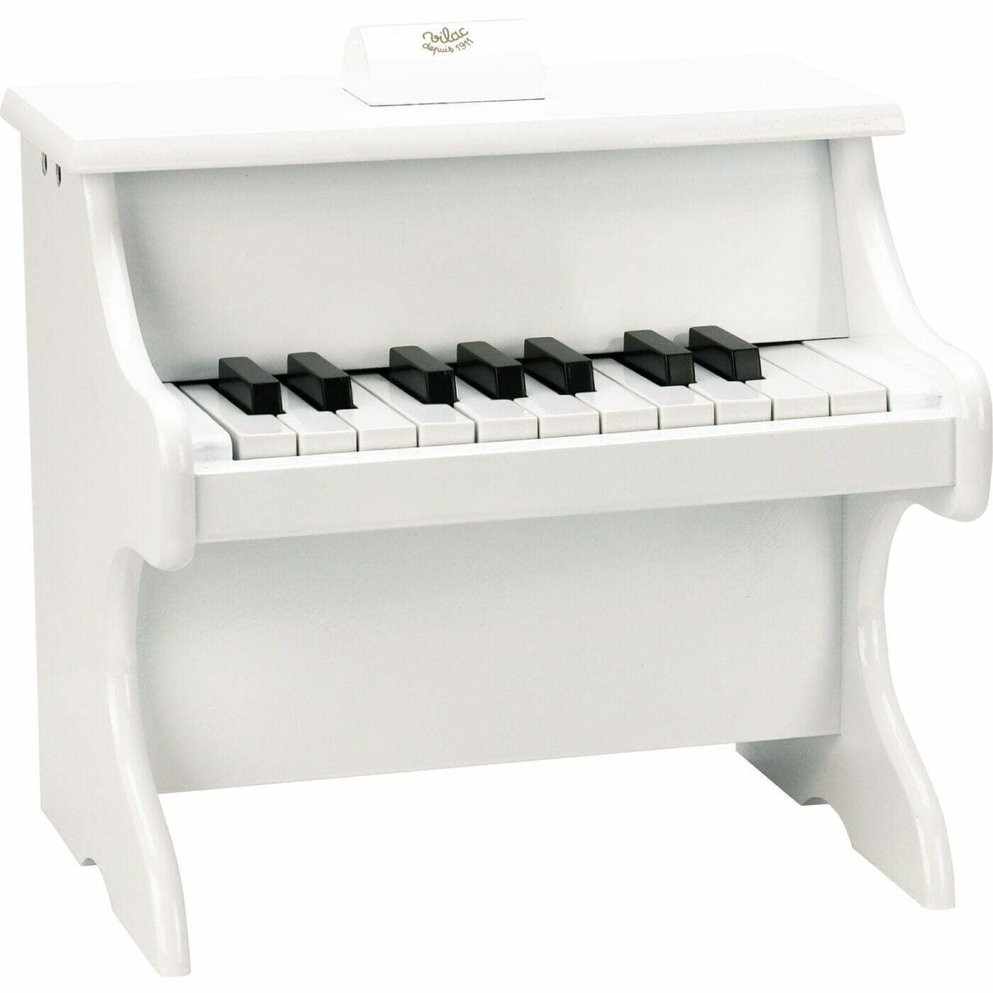 White toy piano with black keys on a white background