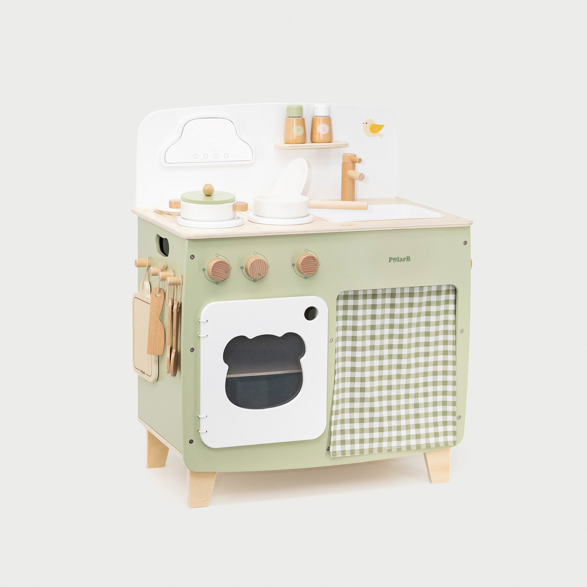 Children's wooden play kitchen set on a white background