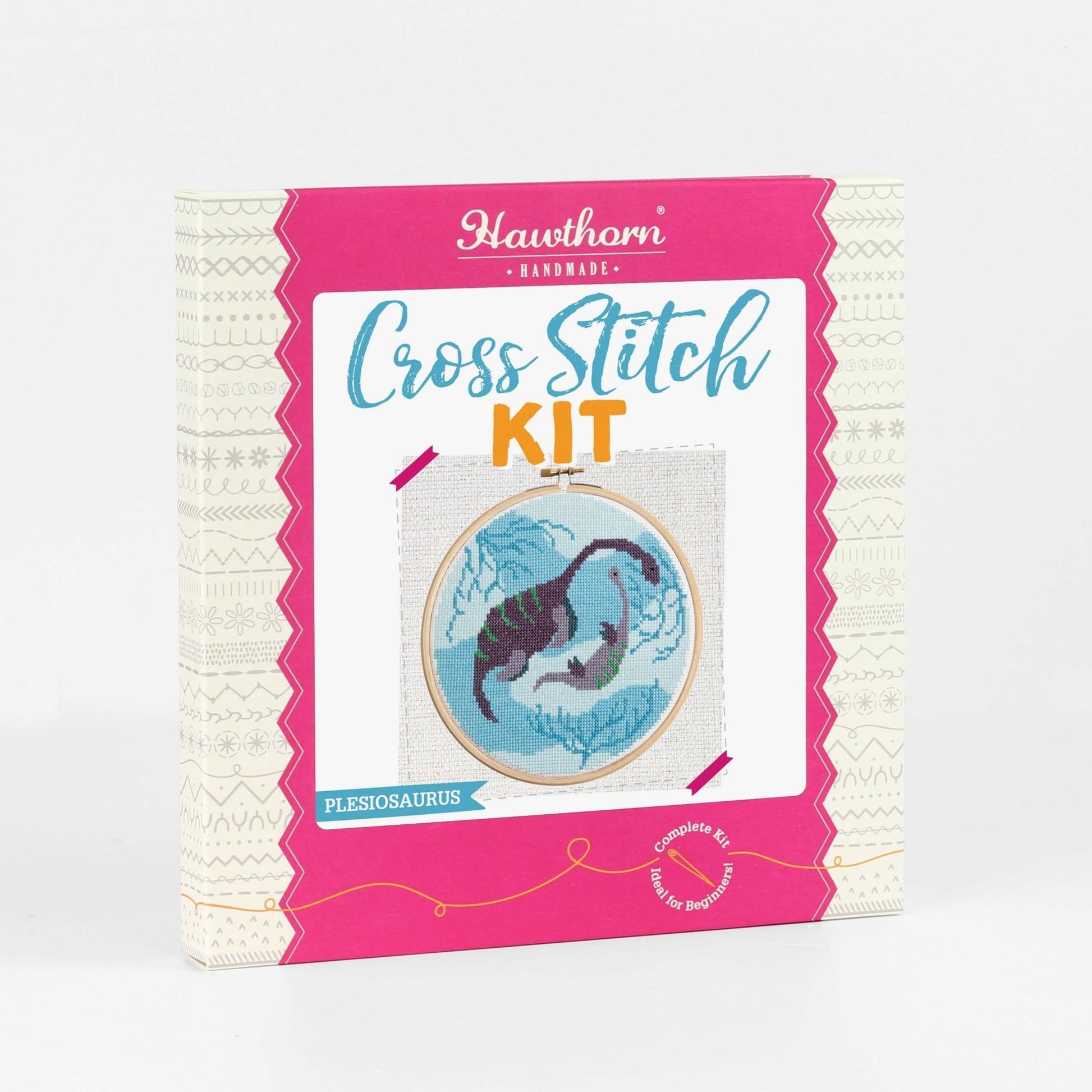 Cross Stitch Kit packaging with dinosaur design on a white background