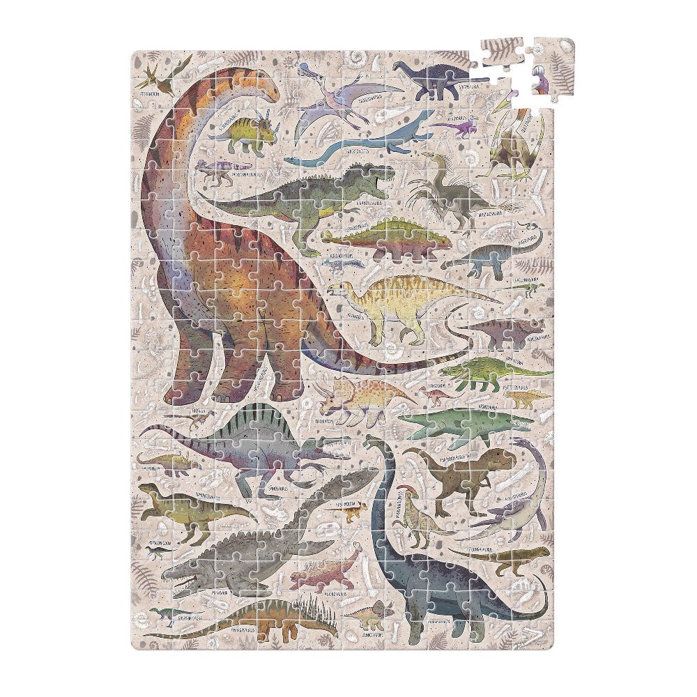 Jigsaw puzzle with colorful dinosaur illustrations on a beige background