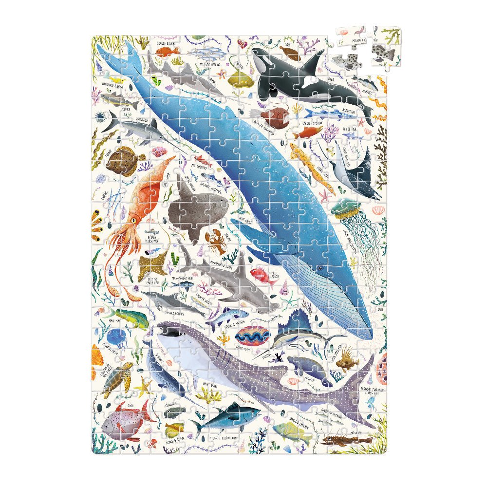 Jigsaw puzzle with ocean-themed design on a white background