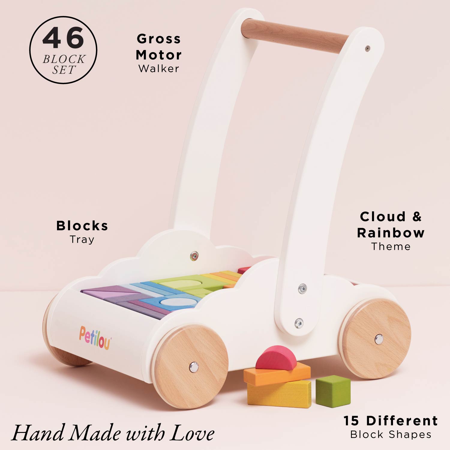 Children's wooden walker with colorful blocks on a pink background