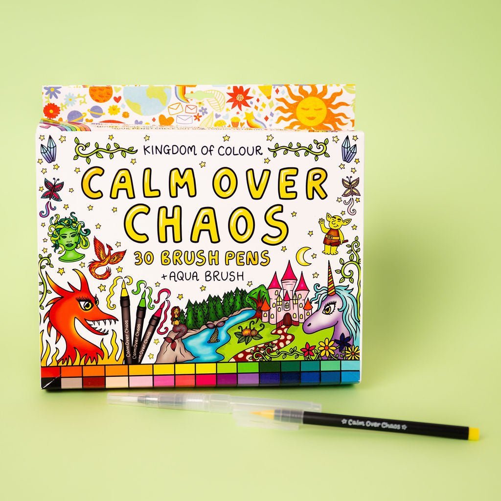 Packaging of 'Calm Over Chaos' brush pens with colorful illustrations on a green background