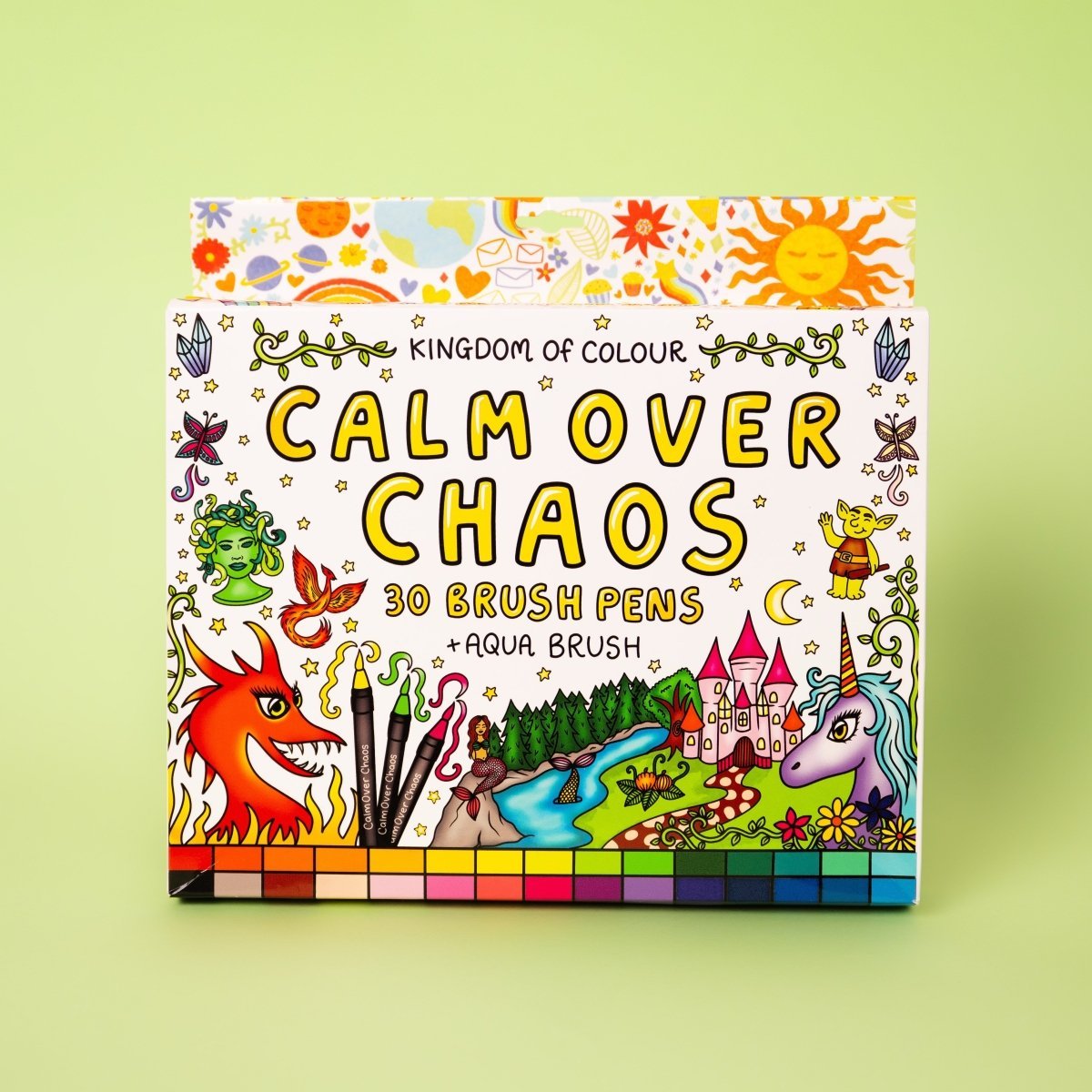 Packaging of 'Calm Over Chaos' brush pens with colorful illustrations on a green background