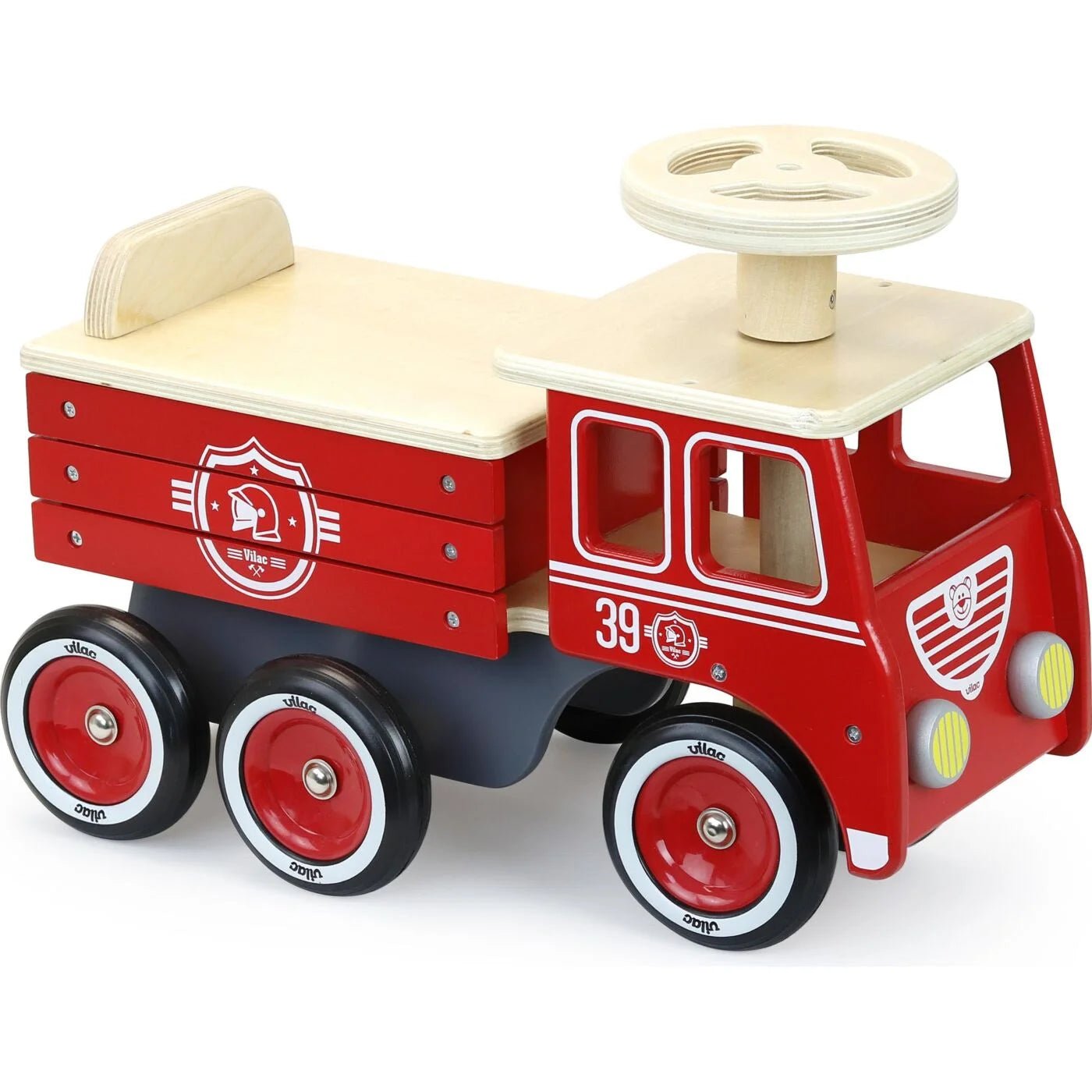 Red toy truck with wooden top and black wheels on a white background