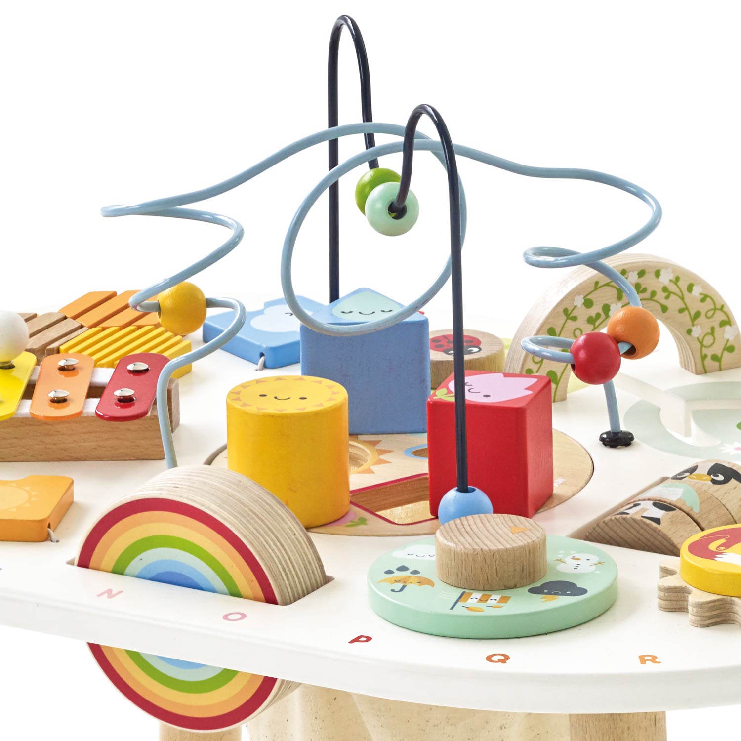 Assorted wooden toys on a white background