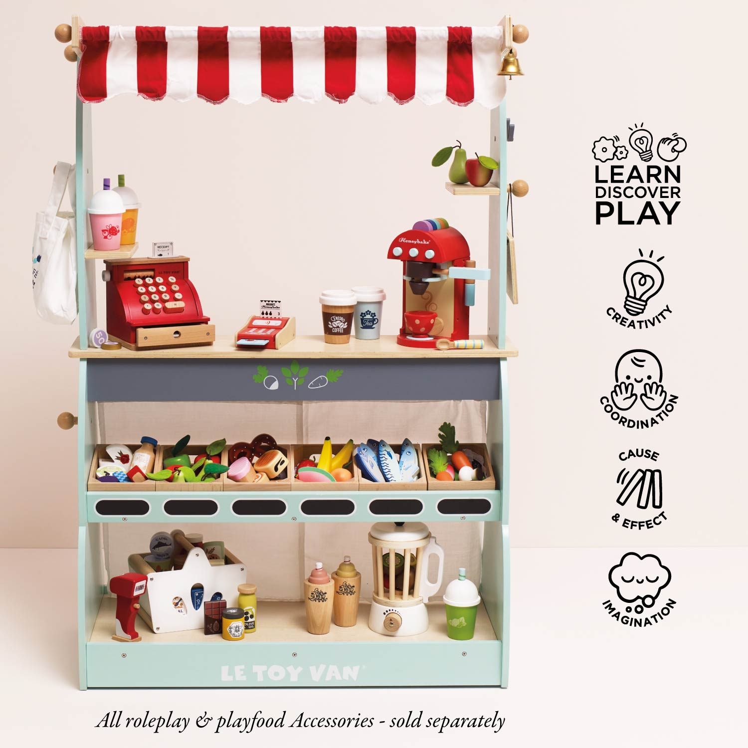 Children's play kitchen set with various accessories on a white background, featuring the brand 'Le Toy Van'.