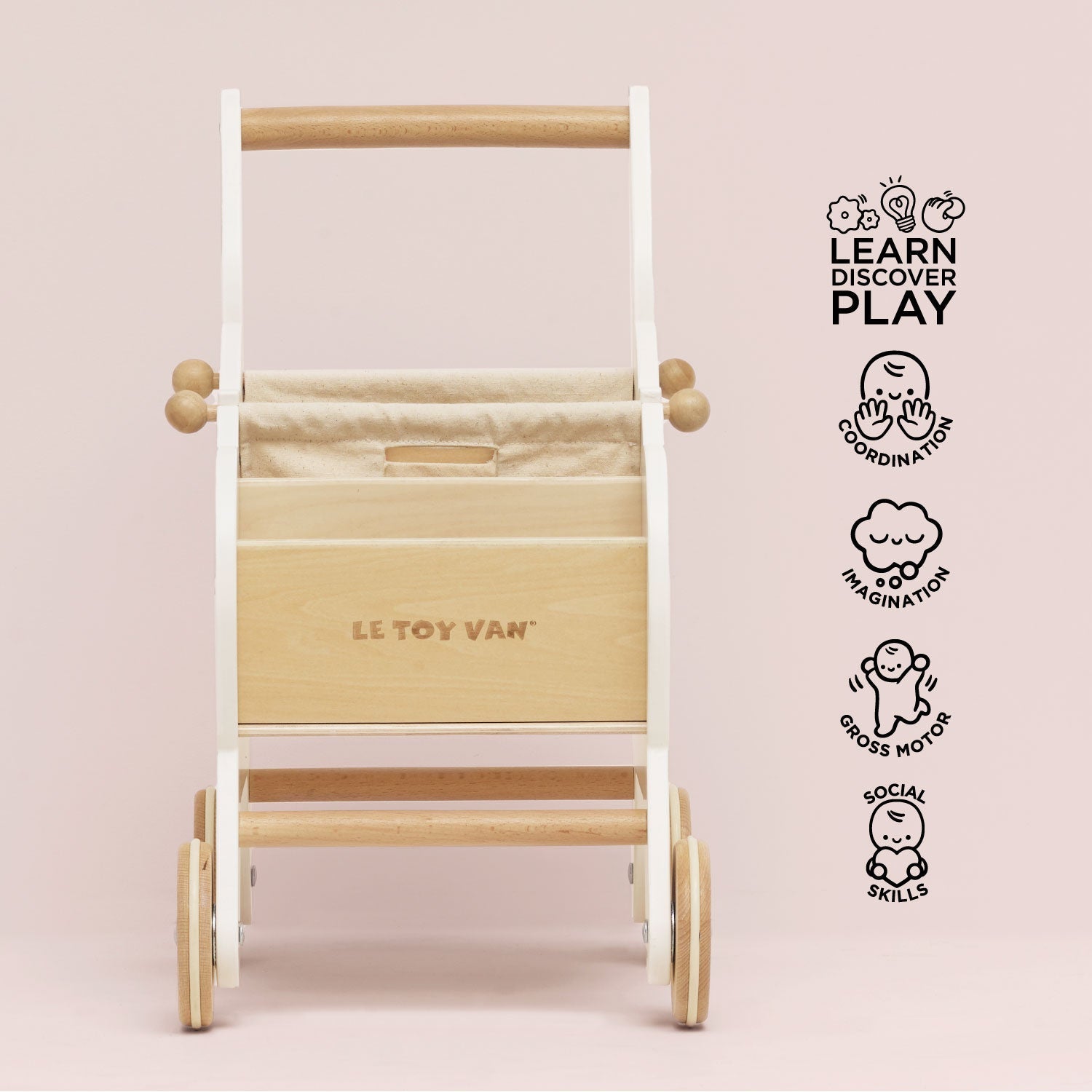 Wooden toy ladder with 'Le Toy Van' branding on a pink background
