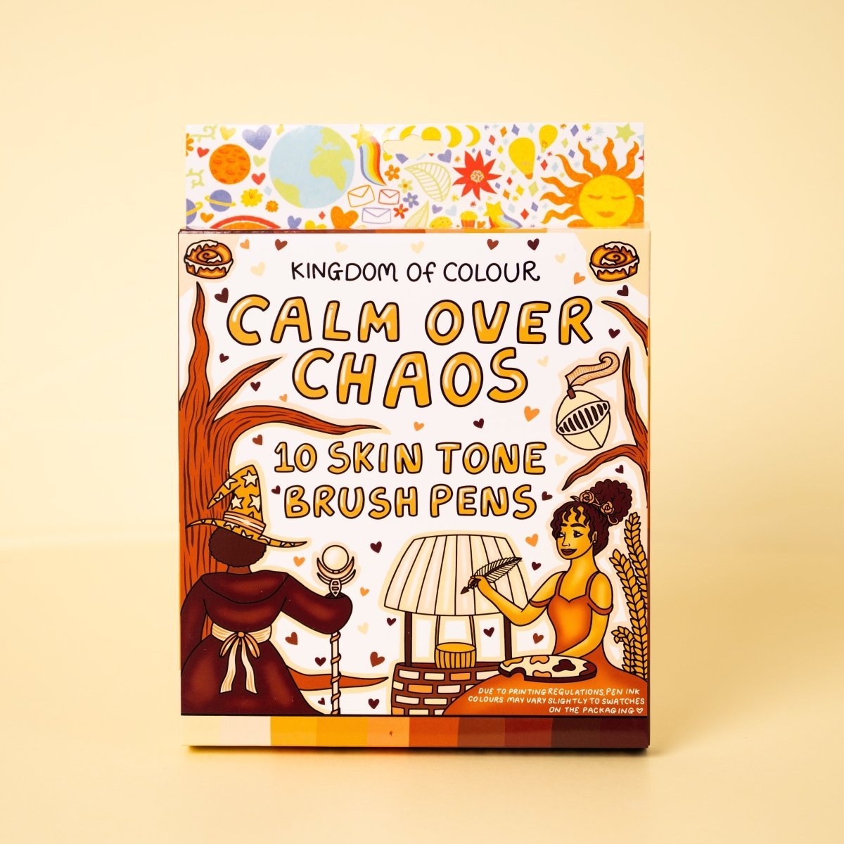 Packaging of 'Calm Over Chaos' skin tone brush pens with colorful illustrations on a beige background.