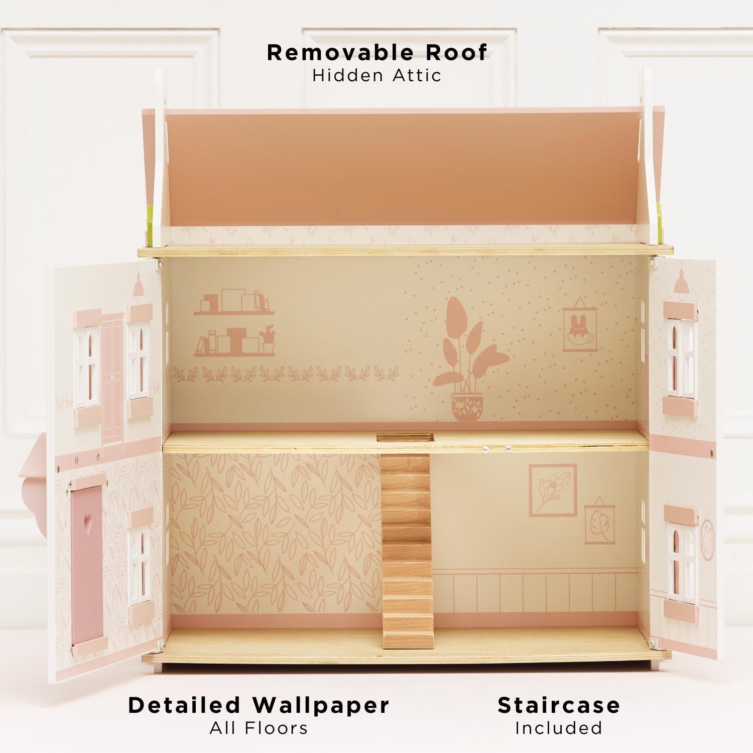 Detailed dollhouse with removable roof, hidden attic, detailed wallpaper, and staircase on a white background.