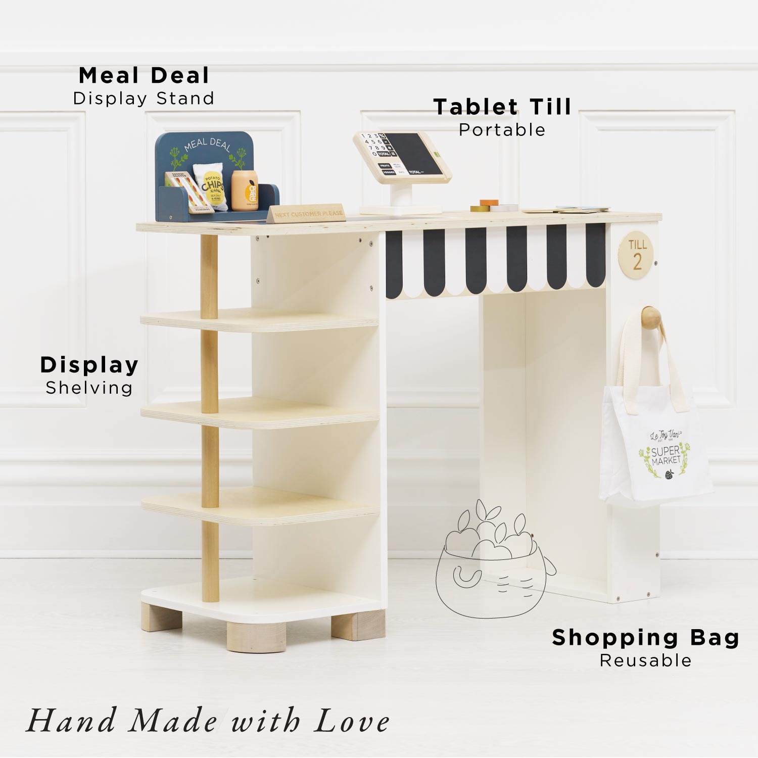 Display stand with tablet till, display shelving, and reusable shopping bag on a white background.