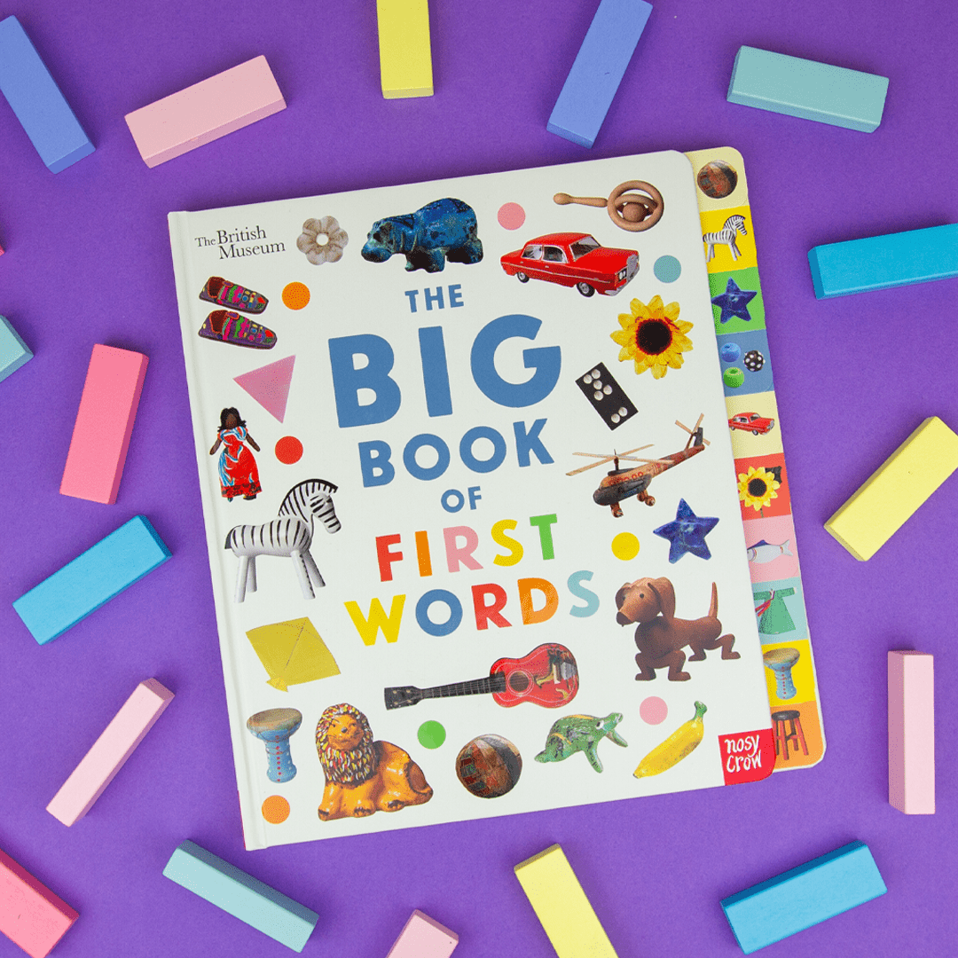 Children's book titled 'The Big Book of First Words' on a purple background with colorful blocks.