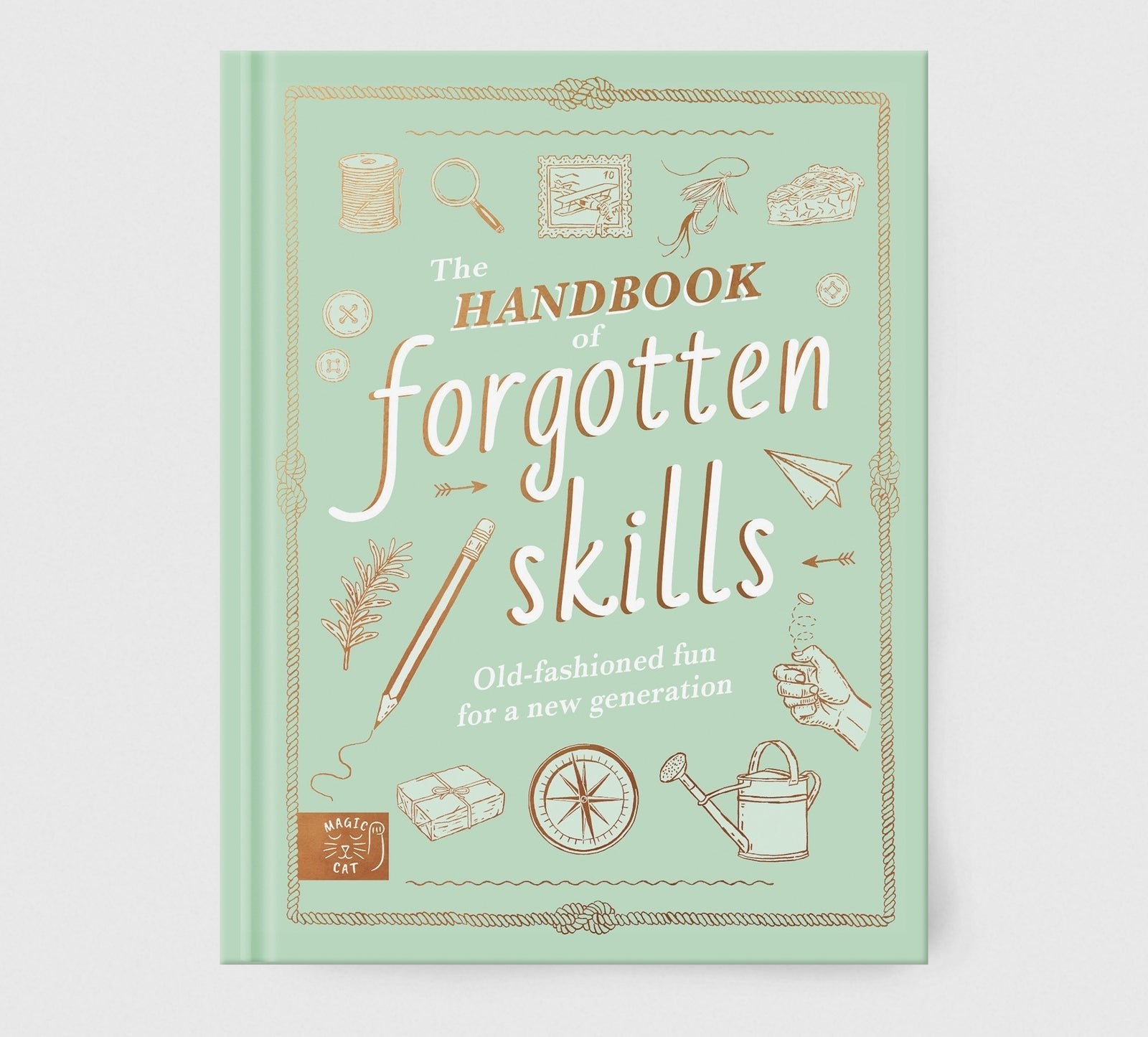 Book titled 'The Handbook of Forgotten Skills' on a light green background