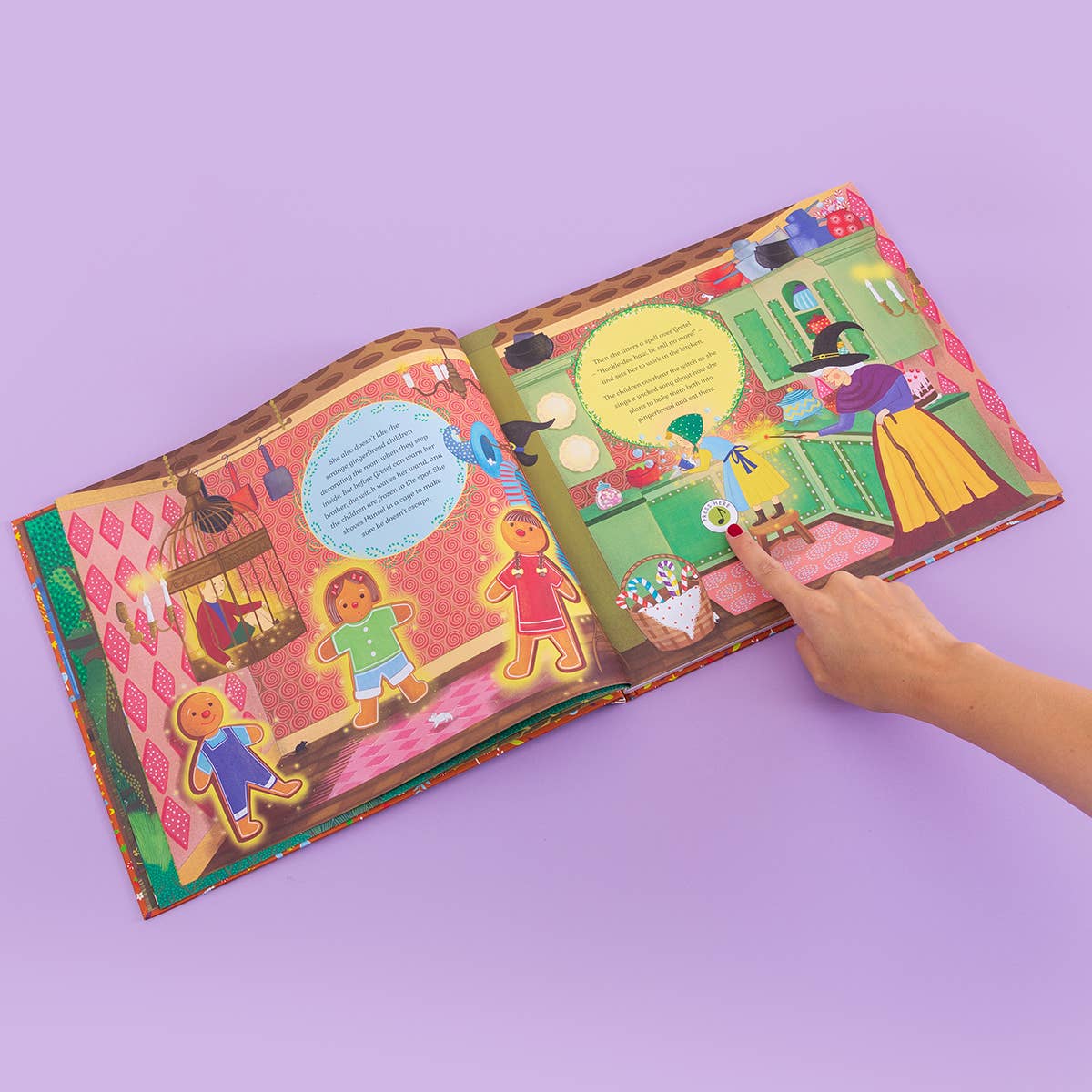 Colorful children's book open on a purple background with a hand pointing to illustrations.