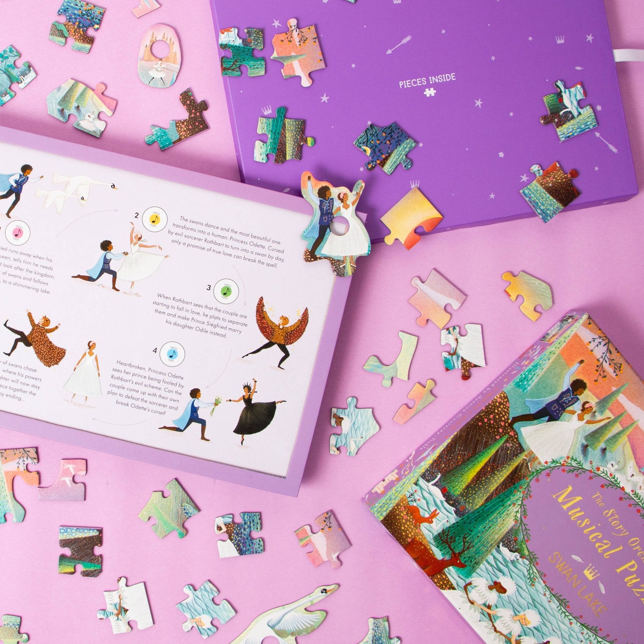 Colorful puzzle pieces and packaging on a pink surface