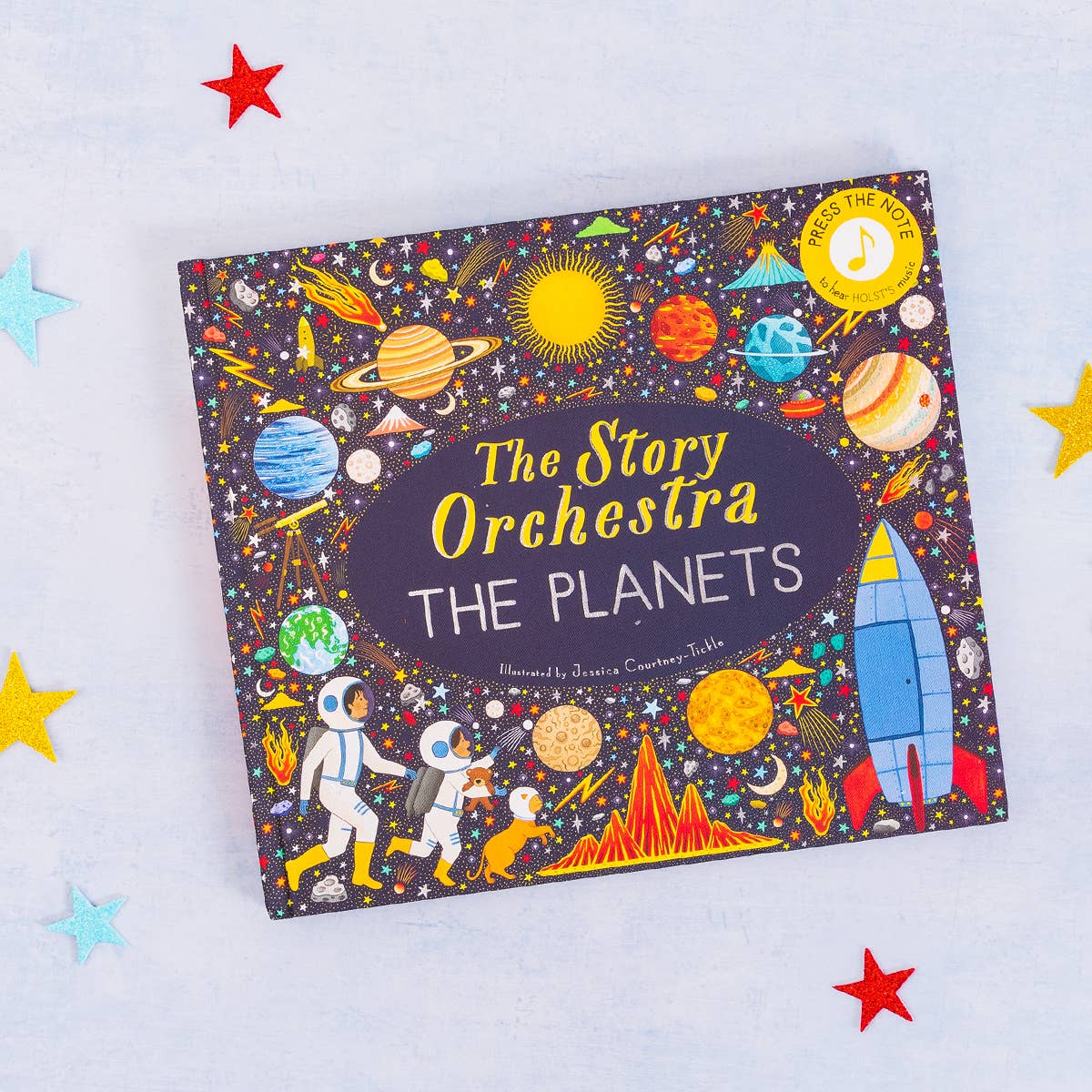 Children's book titled 'The Story Orchestra The Planets' with space-themed illustrations on a light blue background.