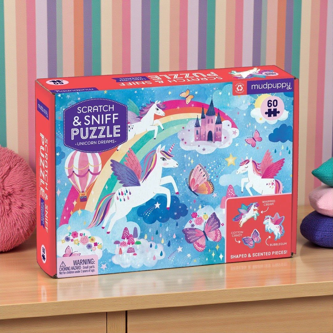 Mudpuppy Scratch & Sniff Puzzle box with unicorns and rainbows on a striped background