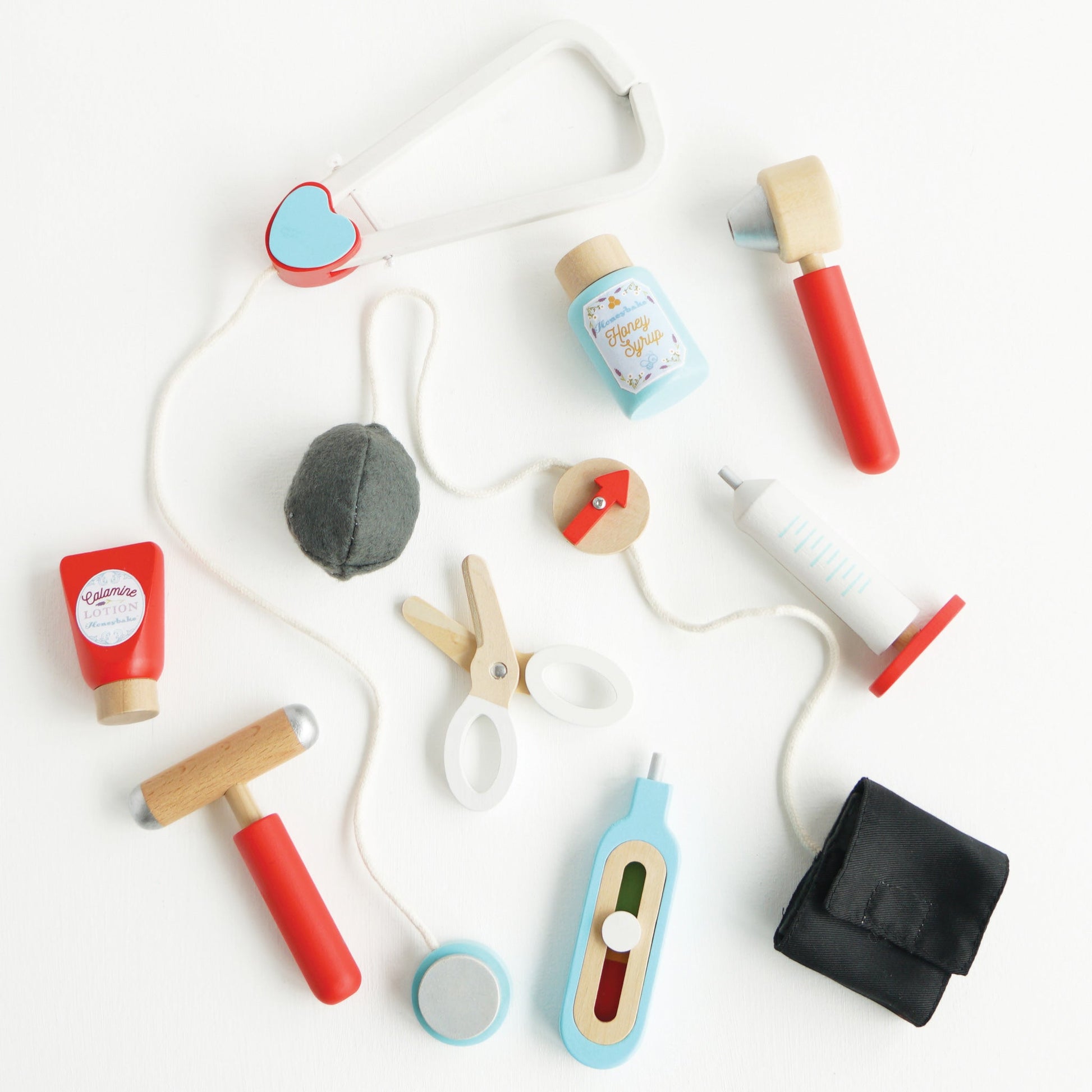 Set of colorful wooden toys on a white background