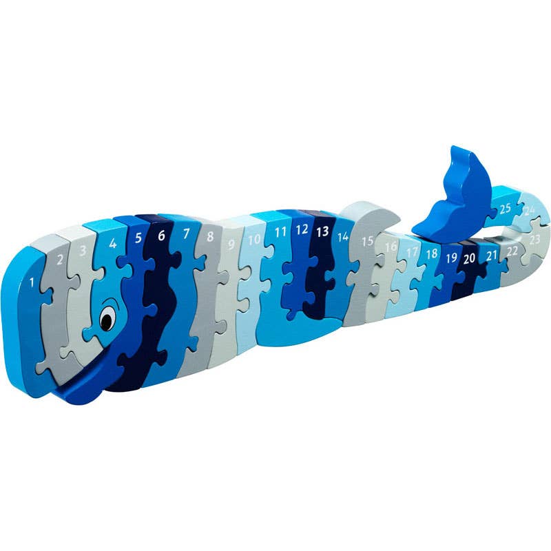 Whale puzzle toy with numbered pieces on a white background