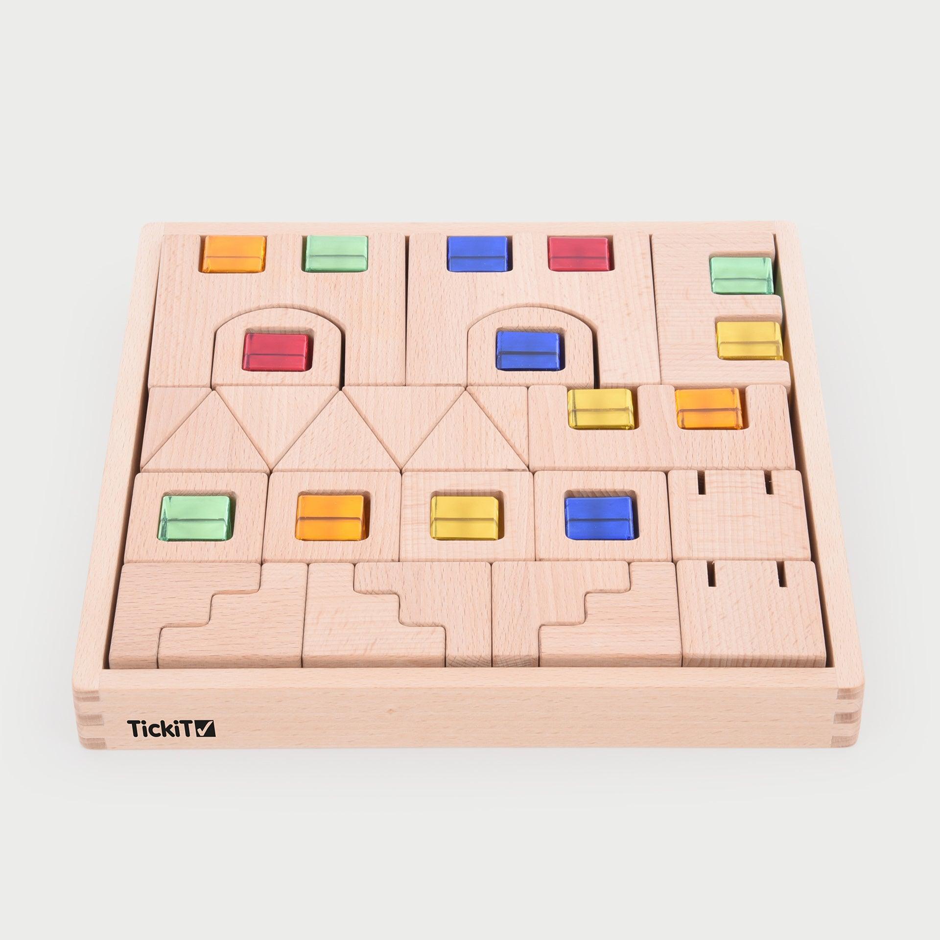 Wooden puzzle with colorful blocks in a box, brand 'TickiT' visible