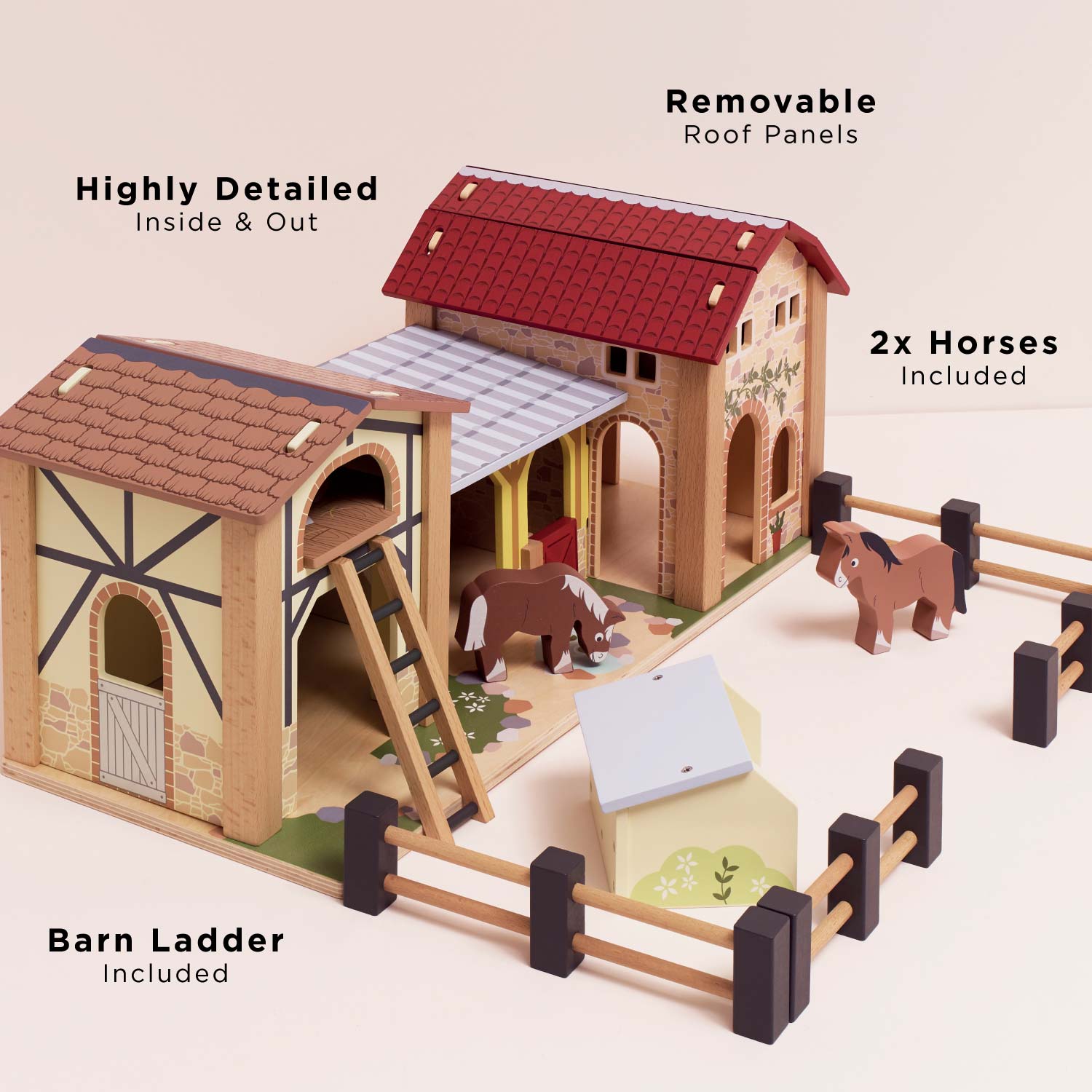 Toy horse stable set with removable roof panels, horses, and a ladder on a beige background.