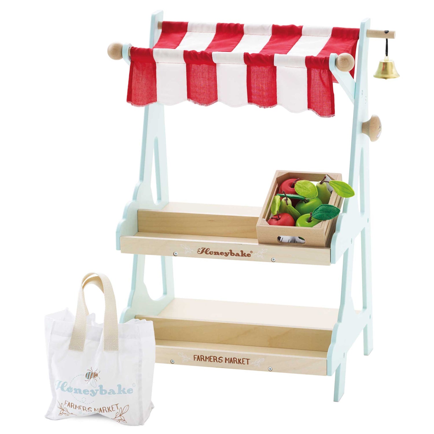 Wooden toy market stand with red and white striped canopy and Honeybake branding.