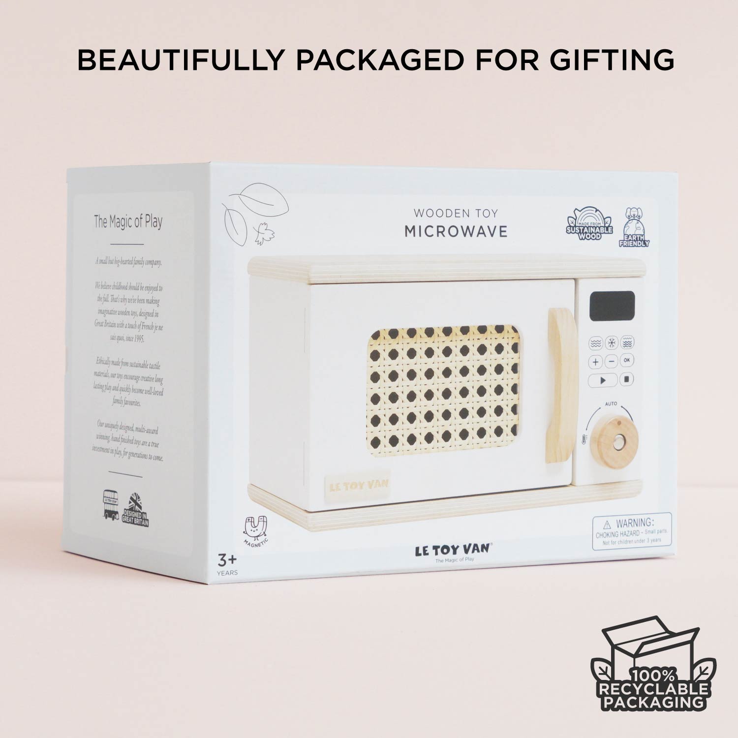 Le Toy Van wooden toy microwave packaging on a beige background