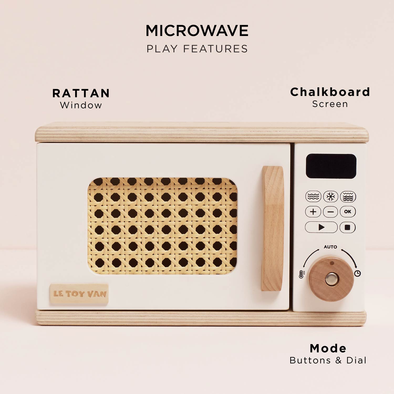Wooden toy microwave with rattan window and chalkboard screen on a light pink background