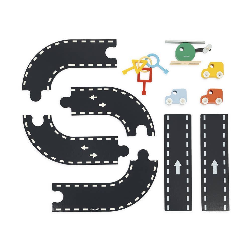 Black toy track set with various colorful cars on a white background