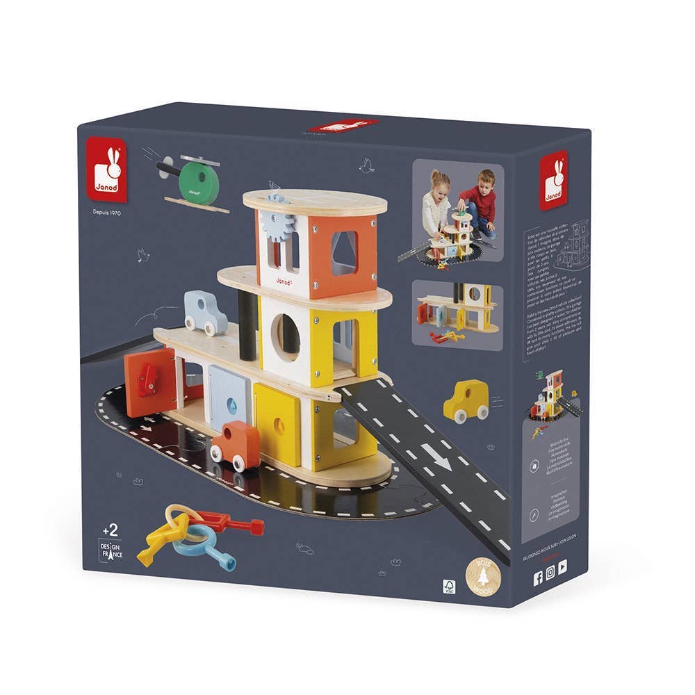 Toy packaging with a wooden toy structure and vehicles on a white background